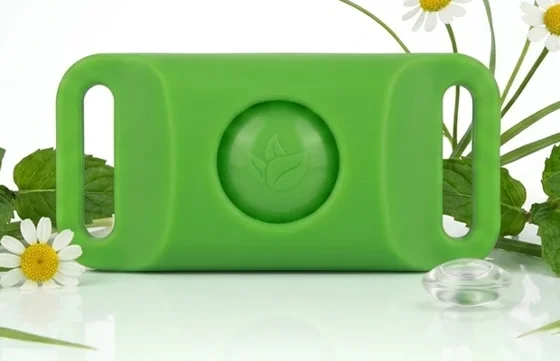Pest-Shield Tag, a green silicone flea and tick tag for dog collars, with peppermint and chamomile